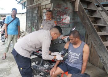 Subsatgas Keladi Sagu Polres Jayapura Gelar Pemeriksaan Kesehatan Gratis di Pangkalan Ojek Kompleks Buton