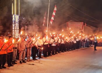 Polres Fakfak Gelar Upacara Taptu dan Pawai Obor Peringati HUT ke-80 Kemerdekaan RI