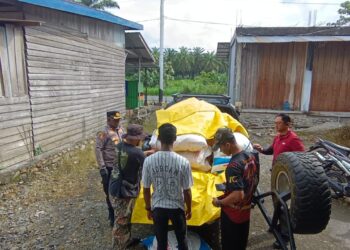 Kapolres Pegunungan Arfak Melaksanakan Giat Pendistribusian Pupuk Kepada Kelompok Tani