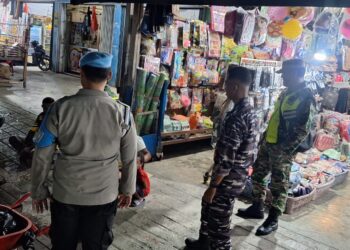 Personel Pos Pam Operasi Lilin Cartenz 2025 Laksanakan Patroli dan Imbauan Jelang Tahun Baru di Sarmi Kota