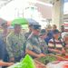 Jelang Idul Fitri 1447 H, Dandim 1310/Bitung Bersama Forkopimda Minut Sidak Pasar dan Bagikan Kupon Subsidi Sembako di Pasar Airmadidi