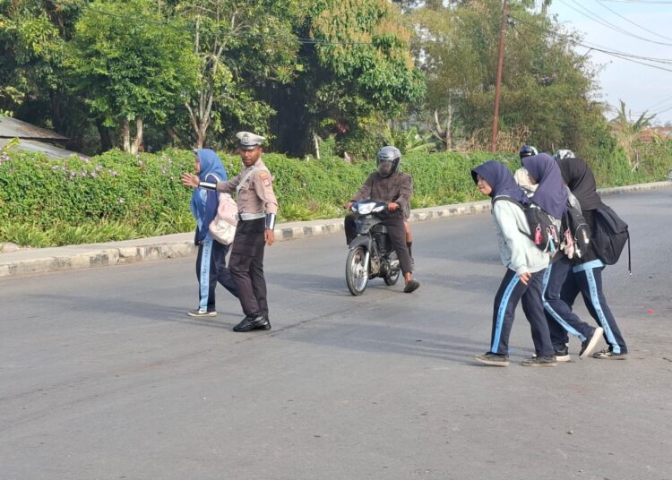 Satlantas Polres Jayawijaya Hadir Sejak Pagi, Jaga Kelancaran Lalu Lintas di Wamena